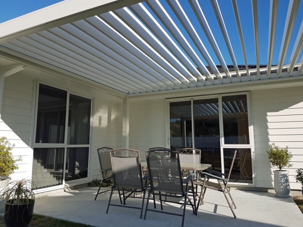 Freestanding Bask Louvre Roof fitted on North Facing Patio open on winters day to let the sunlight in